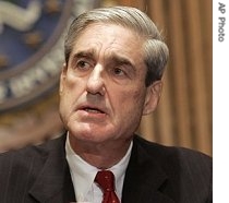 Robert Mueller meets reporters at FBI headquarters in Washington to discuss the a href=