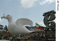 A large dove stands with Ethiopian flags in the background in Addis Ababa's central a href=