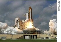 The Space Shuttle Atlantis lifts off launch Pad 39B at the Kennedy Space Center in a href=