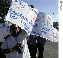 South African civil servants protest outside the Red Cross children's hospital during the first day of a national public service strike in a href=