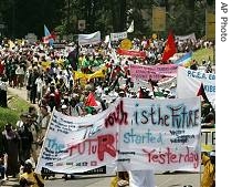 People march during the opening of the World Social a href=