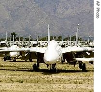 Several of the mothballed F-14 Tomcat fighter jets await a href=