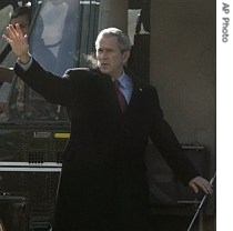 President Bush waves as he boards a href=