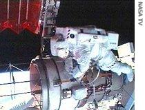 Spacewalker Steve Swanson helps with the a href=