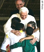 Pope Benedict XVI hugs children during a visit to a drug a href=