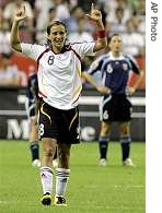 Germany's forward Sandra Smisek celebrates after scoring her second goal at Hongkou Football Stadium in Shanghai, 10 Sep 2007