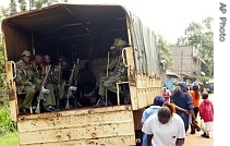 Kenyan police officers investigate violence believed to be caused by a href=
