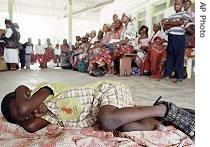 A young boy waits his turn to be tested for a href=