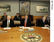 U.S. President Bush (center)seated between a href=