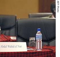 A chair reserved for the Sudan Liberation Movement's Abdel Wahid Mohammed Nur stands empty at the AU-UN sponsored conference to seek peace among Darfur's warring a href=