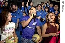 Bollywood actors Esha Deol, left, John Abraham, center, and Remi Sen, right, interact with fans at the a href=