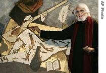 M.F. Husain, India's most famous artist, finishes off a canvas he painted together with Shah Rukh Khan, unseen, one of India's biggest movie stars, during a fund-raising a href=