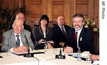 Democratic Unionist Party leader Ian Paisley, left, and Sinn Fein President Gerry Adams speak to reporters, 26 a href=