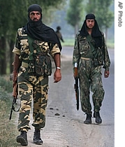 ndian paramilitary soldiers patrol near the site of an explosion in the a href=