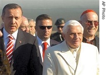 Pope Benedict XVI, accompanied by Vatican Secretary of State a href=