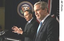 President Bush, right, and British Prime Minister Tony Blair take part in a a href=