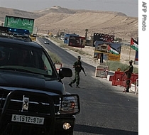 Part of the security detail of Palestinian Authority President Mahmud Abbas secures the a href=