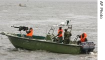 A Nigerian army gunboat arrive at Ikang near Calabar in the Niger a href=