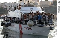 Some 220 illegal immigrants arrive in the southernmost Italian island of Lampedusa after being a href=