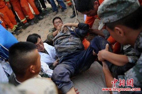 In the very epicenter of the quake, an 88-year-old woman was pulled out of the rubble after being buried for about 50 hours