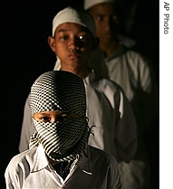 Students of at Al Mukmin Islamic school line up as they prepare to welcome a href=