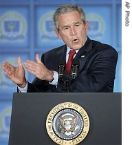 President George Bush addresses an invitation-only crowd of military and a href=