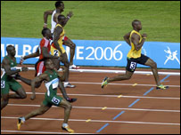 Jamaican Asafa Powell wins a gold medal at the 2006 a href=