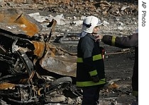 Firefighters work at the site where a TAM airlines jet crashed Tuesday a href=