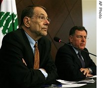 European Union foreign policy chief Javier Solana, left and Lebanese Prime Minister Fuad Saniora talk to reporters during a a href=