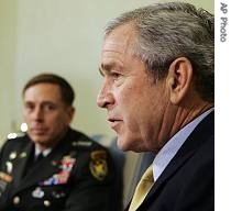 President Bush makes a statement on the war in Iraq in White House, 23 Apr 2007. With him is Gen. David Petraeus, commander of the a href=