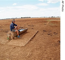 Farmer Andrew Higham looks over his a href=