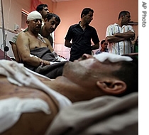 Injured Iraqis from the village of Abu Saydah in the a href=