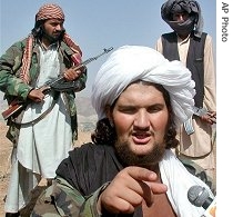 Abdullah Mehsud, a former Guantanamo Bay prisoner, talks to the media as his a href=