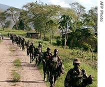 UPDF soldiers patrol near the border with Congo after they engaged rebels from the Congolese a href=