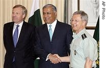 Pakistan's PM Shaukat Aziz, center, shakes hands with NATO's General Bantz John Craddock as Sec-Gen Jaap de a href=