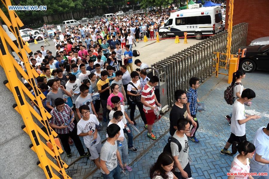 Candidates enter World Foreign Language School for the National College Entrance Exams in Hefei, capital of east China