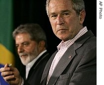 President Bush, right, and Brazil's President Luiz Inacio Lula da Silva attend a a href=