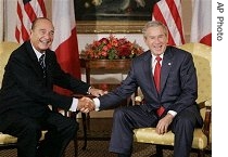 President Bush meets with French President Jacques Chirac during a href=