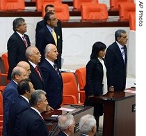 Newly elected Turkish and Kurdish lawmakers sing the national a href=