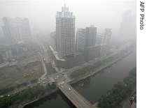 Chengdu, China is covered in a heavy haze, caused by tons of dry stalks burning on the city's a href=