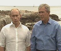 Russian President Vladimir Putin (l) and U.S. President Bush during a a href=