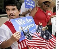 Supporters of immigration legislation gather in Little Rock, Arkansas, as they learn of the Senate's a href=