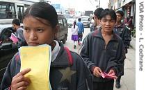 YCL members hand out pamphlets during campaign launched 26 Jun 2007