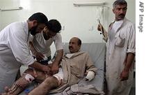 A wounded man is treated at a hospital after a car exploded at the funeral of the murdered nephew of a local a href=