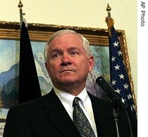 Robert Gates listens to a question during a a href=