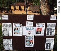 Election posters are pictured on a board in Kinkala, Congo, 24 June 2007