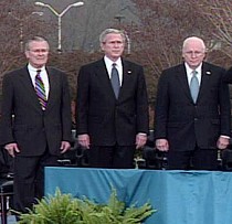 From left, Donald Rumsfeld, President Bush and a href=