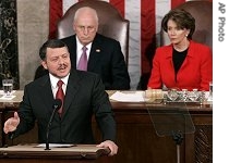 King Abdullah (l) gestures while addresses a joint meeting of Congress on Capitol Hill in Washington, 7 a href=