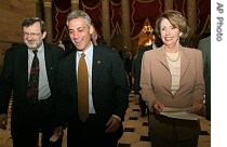 House Speaker Nancy Pelosi, right, accompanied by Rahm Emanuel, center, and David Obey, walk to the Speaker's office on Capitol Hill in Washington, a href=