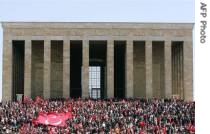 Thousands of Turks march towards Ataturk's mausoleum for a wreath laying ceremony in support of a href=